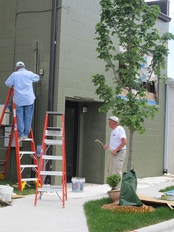 Painting the West Exterior of the Resource Center
